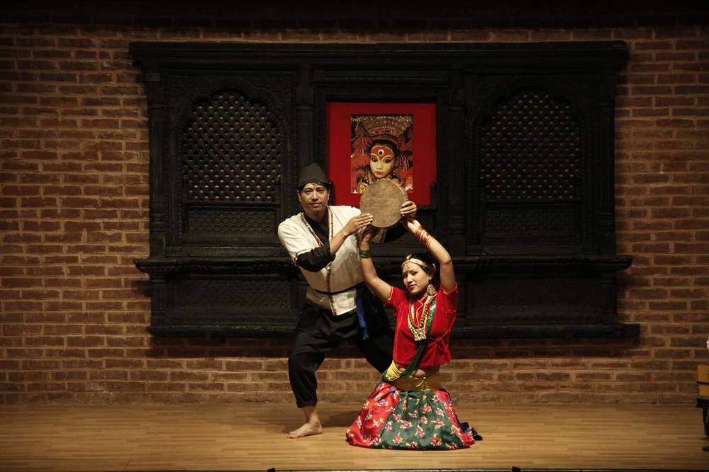 Dancers in traditional costume performing together