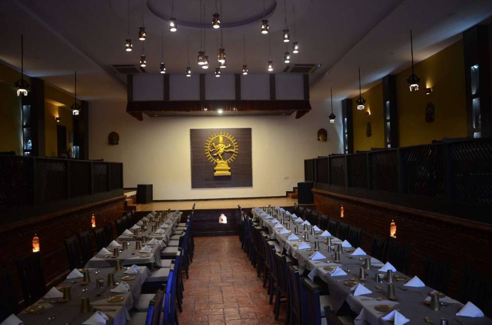 The main dining hall and stage, set for service
