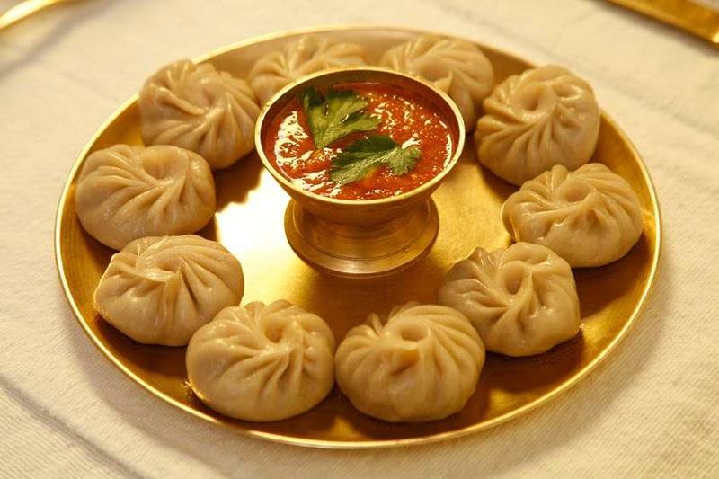Steamed chicken momo dumplings